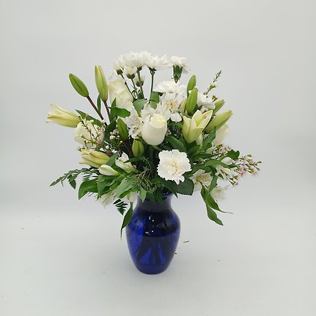 White arrangement with Blue Vase